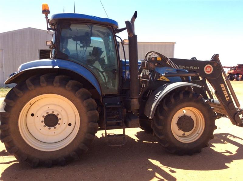 Photo 1. New Holland T7040 tractor
