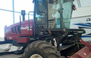 Photo 1. MacDon M205 windrower