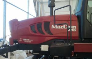Photo 2. MacDon M205 windrower