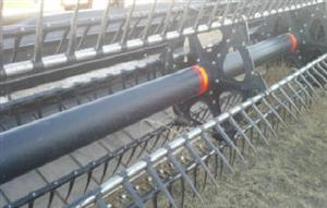 Photo 3. MacDon M205 windrower