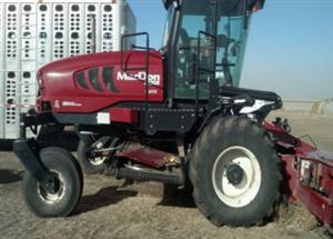 Photo 2. MacDon M205 windrower
