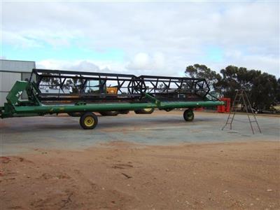 Photo 2. Macdon 590 Trailed Pto Windrower