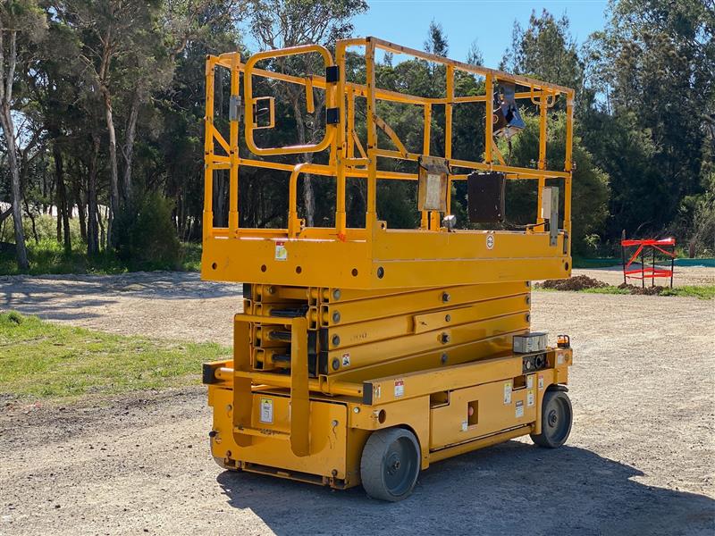 Photo 4. Haulotte Compact 12 12M electric scissor lift elevated work platform