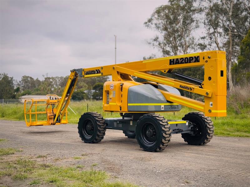 Photo 2. Haulotte HA20PX all terrain diesel boom scissor lift elevated work platform