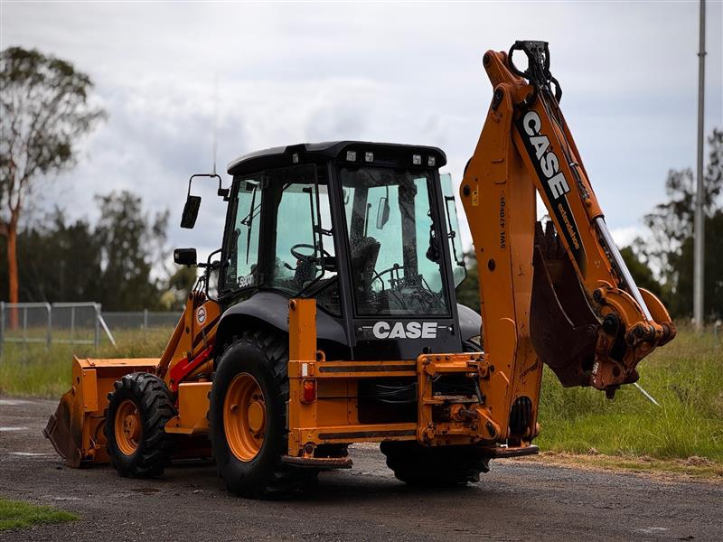 Photo 2. Case 580T backhoe loader