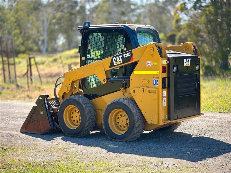 Photo 3. Caterpillar 226D a/c cabin wheeled skid steer loader