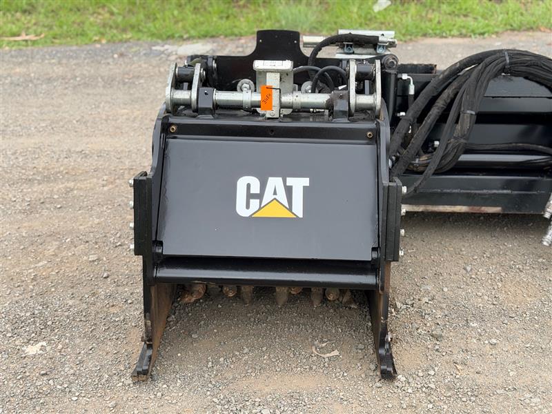 Photo 3. Caterpillar PC306 road profiler cold planner