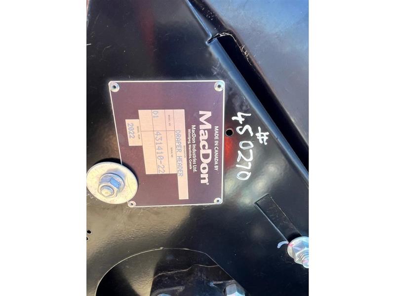 Photo 3. Macdon D125 harvester front