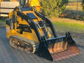 Photo 1. Vermeer SC650TX Skid Steer Loader