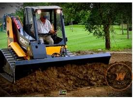 Photo 1. Digga dozer blade attachment