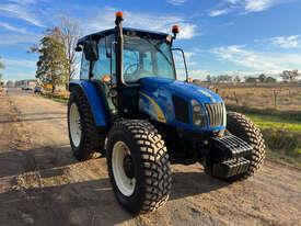 Photo 1. New Holland T5040 FWA/4WD Tractor