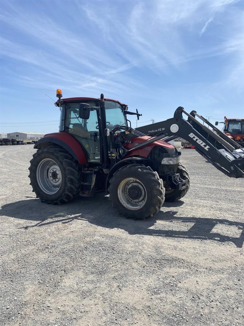 Photo 1. Case IH Farmall 115U tractor