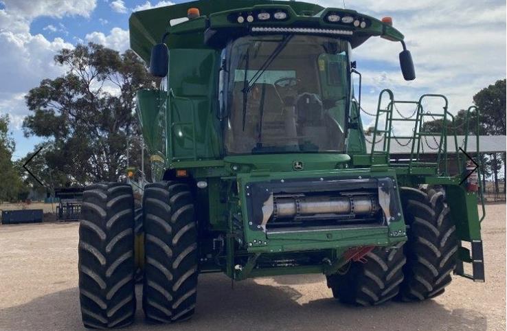 John Deere S780 with 640FD & trailer...