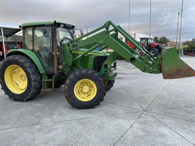 Photo 1. John Deere 6320 tractor