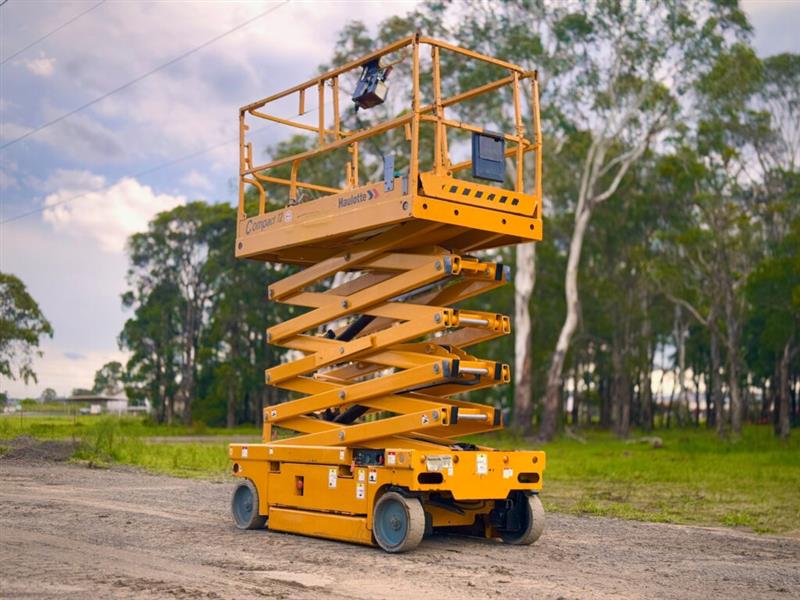 Photo 1. Haulotte Compact 12 12M electric scissor lift elevated work platform