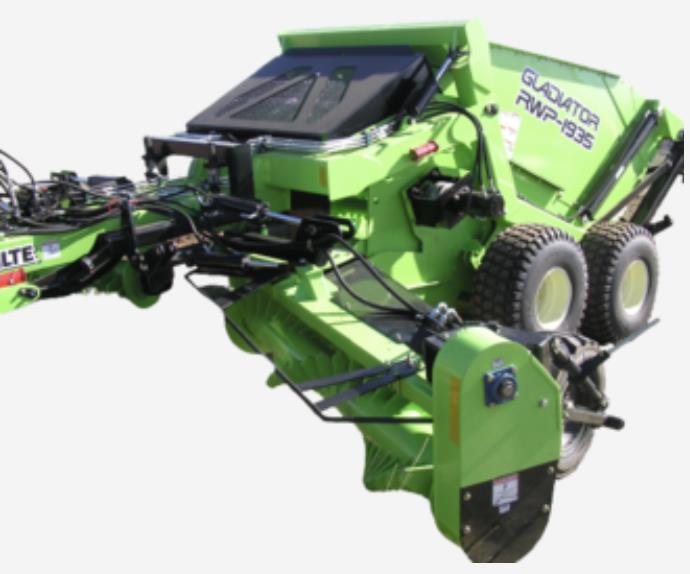 Photo 2. Schulte Spartan RWP-1935 rock windrower picker