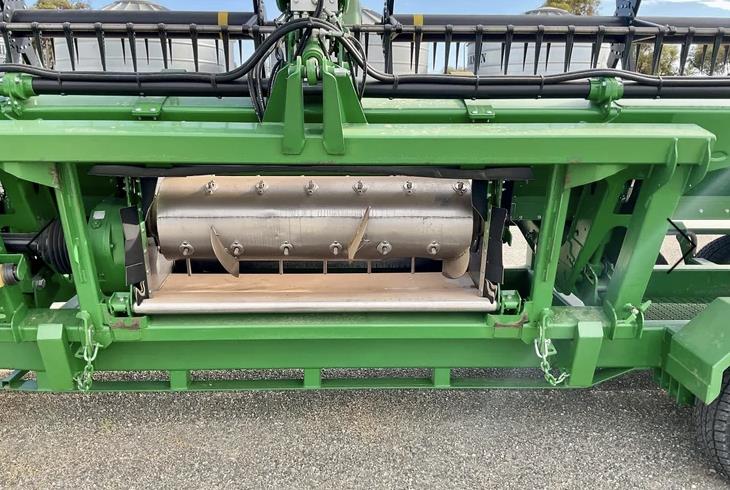 Photo 3. John Deere S680 & 740 harvester front