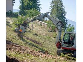 Photo 3. FAE SCL/HY SCL/EX SCM/EX Stump Grinder Attachments