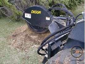 Photo 2. Digga stump grinder skid steer stump grinder attachments
