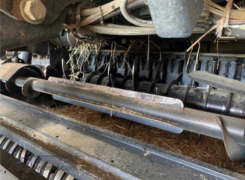 Photo 4. New Holland Roll-Belt 150 Round Baler