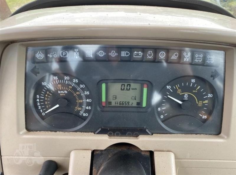 Photo 4. John Deere 6320 tractor