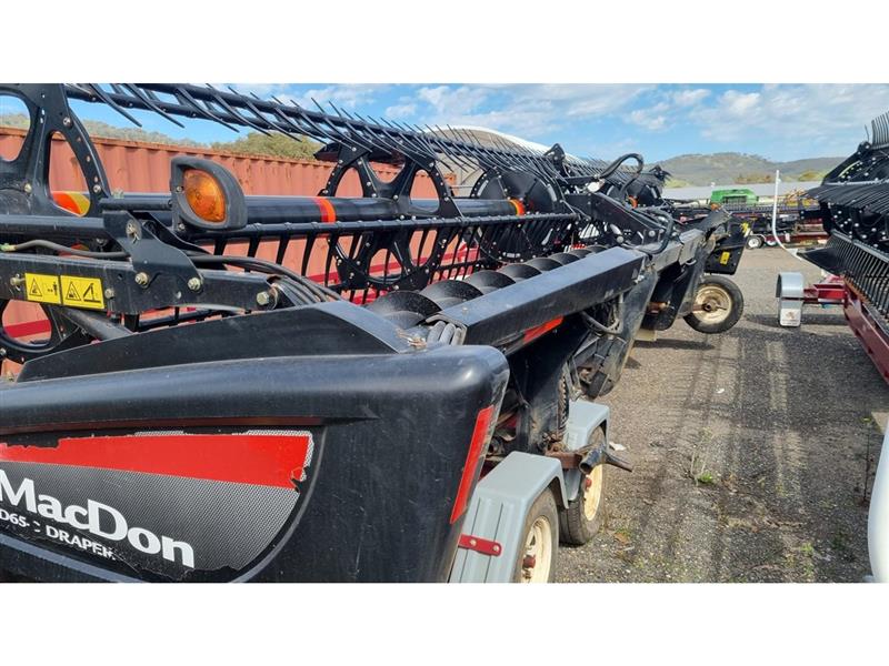 Photo 4. MacDon D65 harvester front