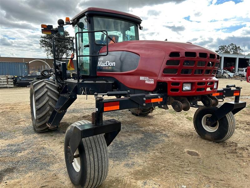 Photo 2. MacDon M150 windrower