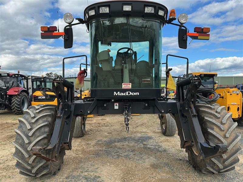 Photo 5. MacDon M150 windrower