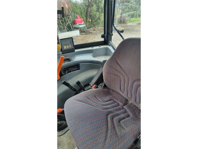 Photo 5. New Holland TL90 tractor