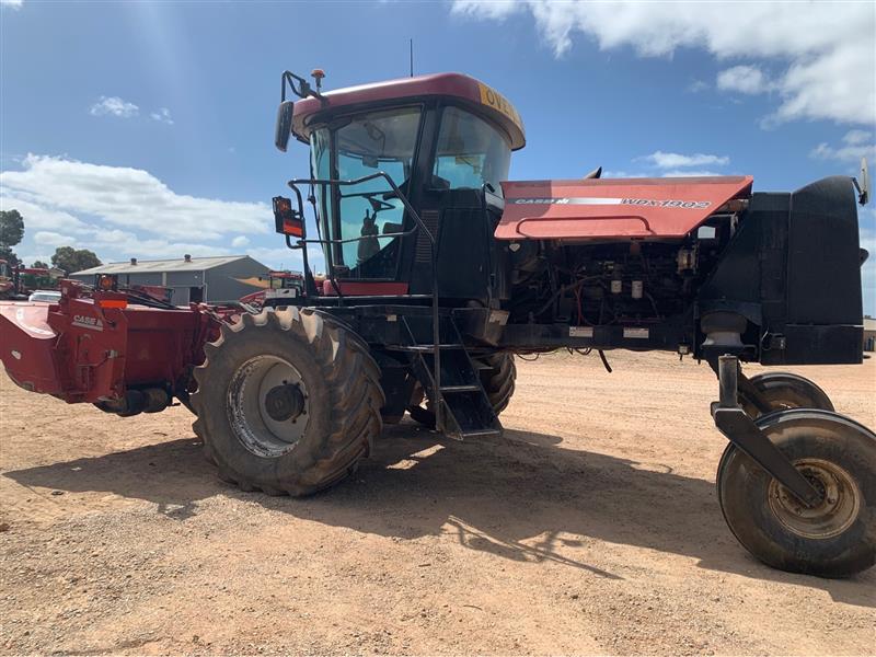 Photo 4. Case IH WDX1902 Self Propelled Windrower and RDX161 disc Mower