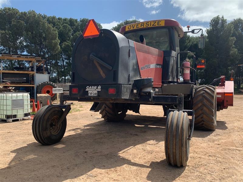 Photo 5. Case IH WDX1902 Self Propelled Windrower and RDX161 disc Mower