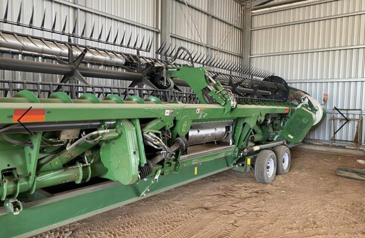 Photo 5. John Deere S780 with 640FD & trailer combine harvester