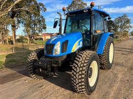 Photo 2. New Holland T5040 FWA/4WD Tractor