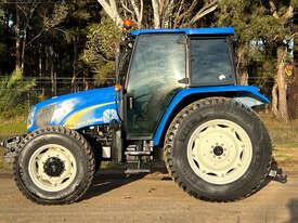 Photo 3. New Holland T5040 FWA/4WD Tractor