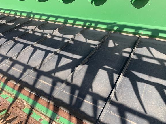 Photo 3. John Deere 640D harvester front