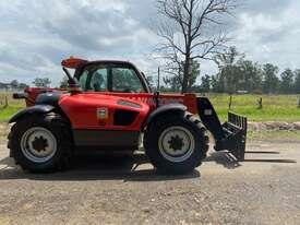 Photo 2. Manitou MT732 Telescopic Handler