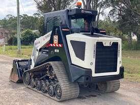 Photo 3. Terex PT100G Skid Steer Loader