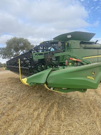 Photo 3. John Deere HD35R harvester front