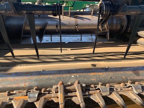 Photo 2. MacDon D65 harvester front