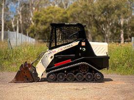 Photo 3. Terex PT30 Skid Steer Loader