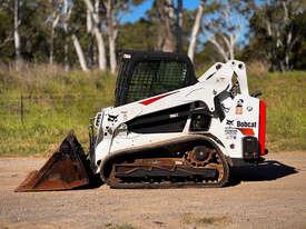 Photo 3. Bobcat T595 Skid Steer Loader
