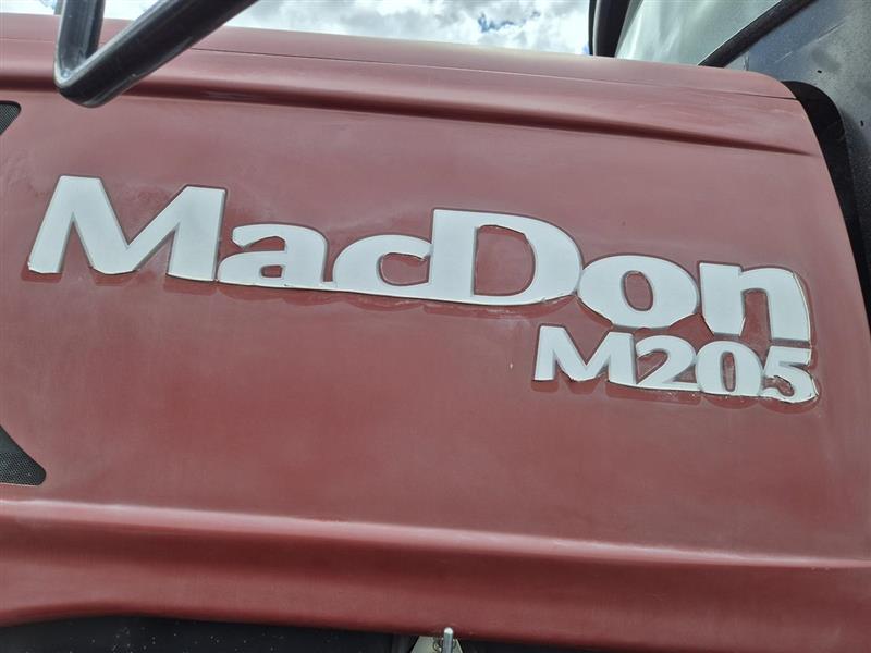 Photo 2. MacDon M205 windrower