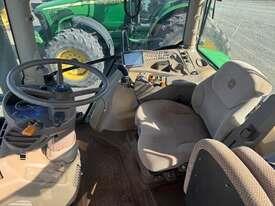 Photo 2. John Deere 6140R row crop tractor