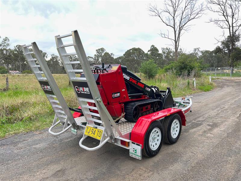 Photo 2. Toro TX525 mini loader tight access skid steer