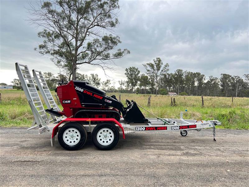 Photo 3. Toro TX525 mini loader tight access skid steer