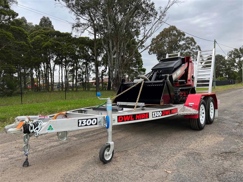 Photo 4. Toro TX525 mini loader tight access skid steer