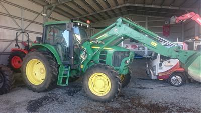 John Deere 6530 tractor with loader