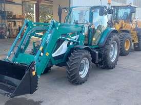 Photo 3. Lovol P4110 tractor with 4in1 front end loader