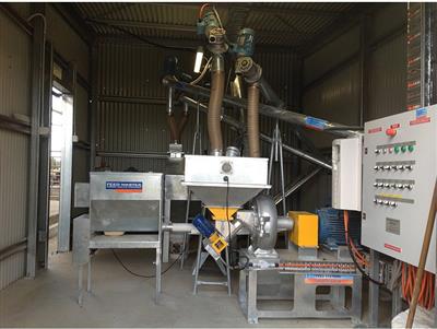 Photo 4. NFS FEEDMASTER ATTRITION DISC MILLS