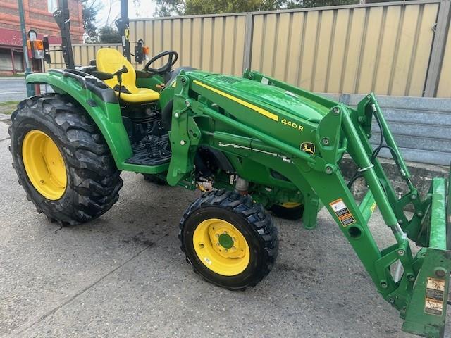 Photo 3. John Deere 4066M tractor with loader